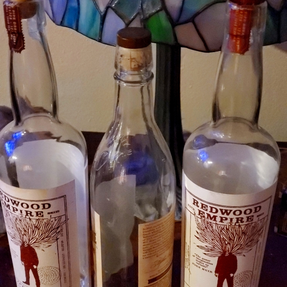Empty Whisky Bottles with Corks